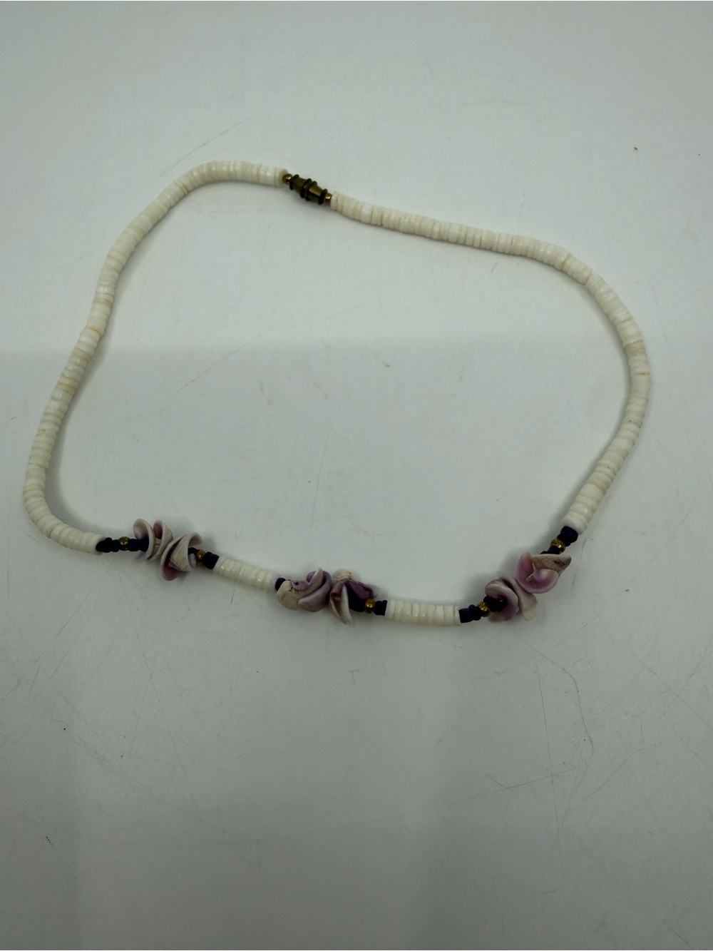 Stylish White Shell Bead Necklace with Purple Shell Flowers